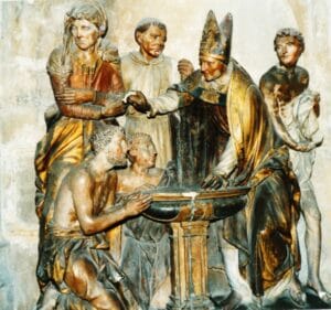 Agustinus wordt gedoopt door Ambrosius van Milaan. Foto: heiligen.net